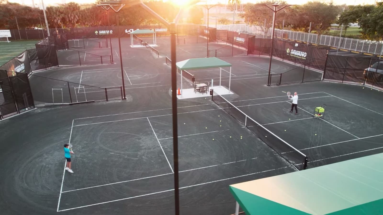 Training on the Saviano courts at sunset
